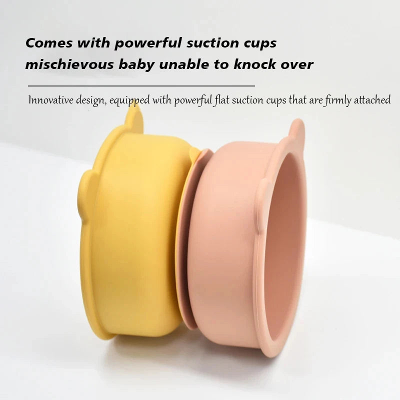 Two baby cups, one yellow and one pink, with text about powerful suction cups on a light gray background.