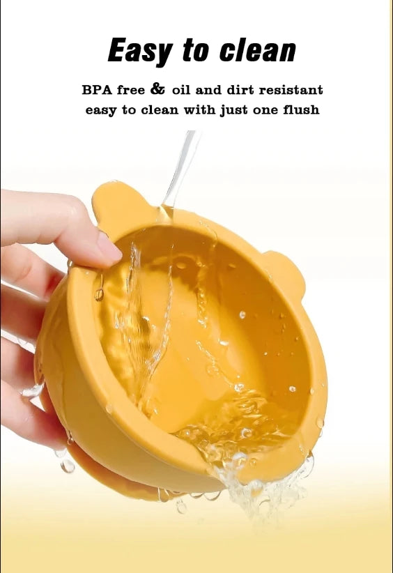 Yellow pet bowl being rinsed with water, text indicating ease of cleaning and BPA-free properties.