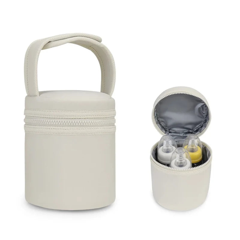 Beige baby bottle travel bag with a smaller bag inside on a white background