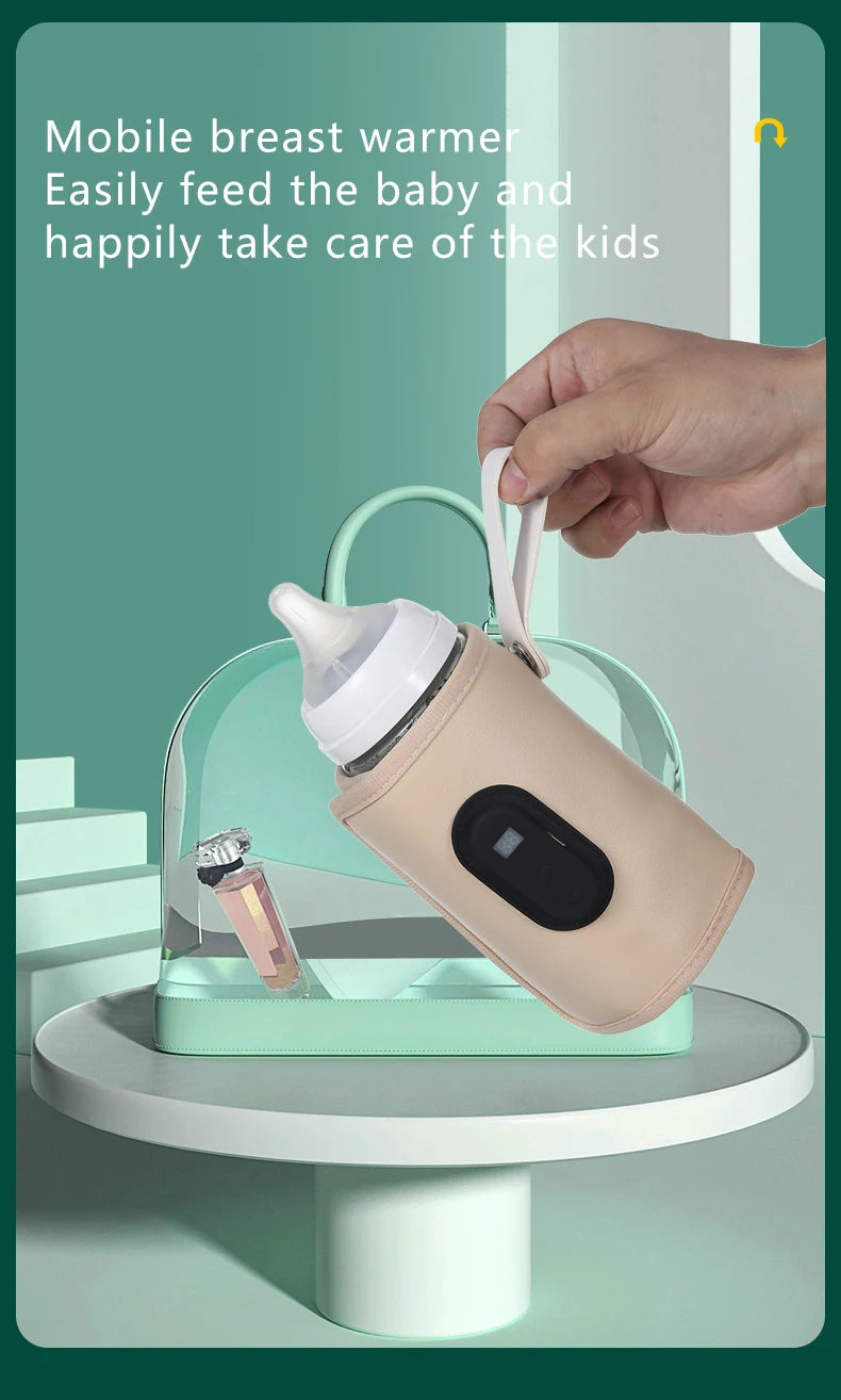 Hand holding a beige mobile breast warmer with text on a green background