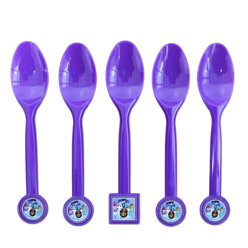 Set of five purple spoons with cartoon character designs on a white background