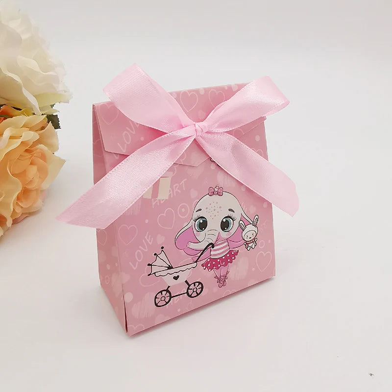 Pink gift box with cartoon elephant design and pink ribbon on a white background