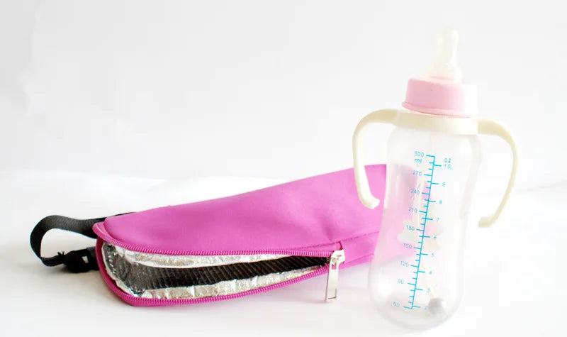 Pink waist bag with reflective strip and baby bottle on a white background