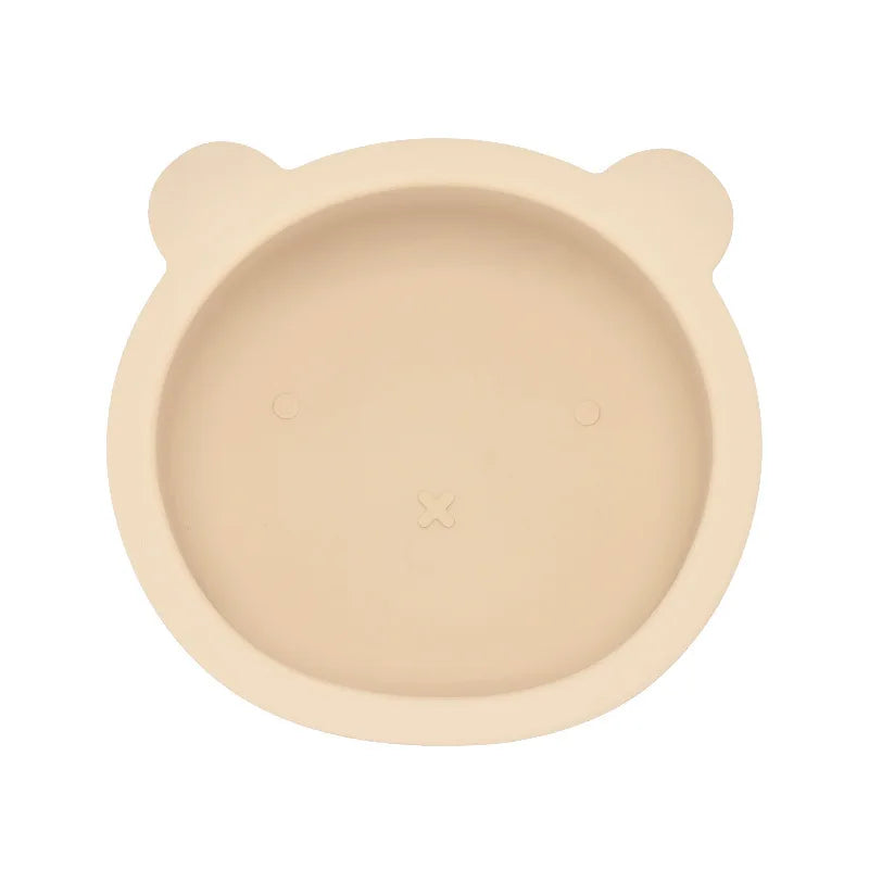Beige bowl with bear ears on a white background