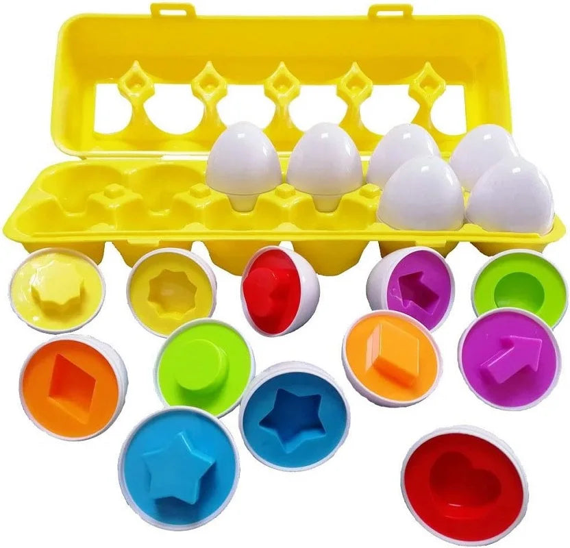 Colorful shape sorting toys with an egg carton container on a white background