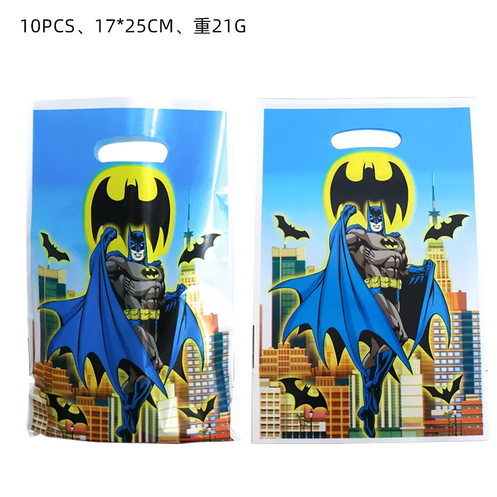 Two Batman-themed gift bags with a cityscape background on a white background.