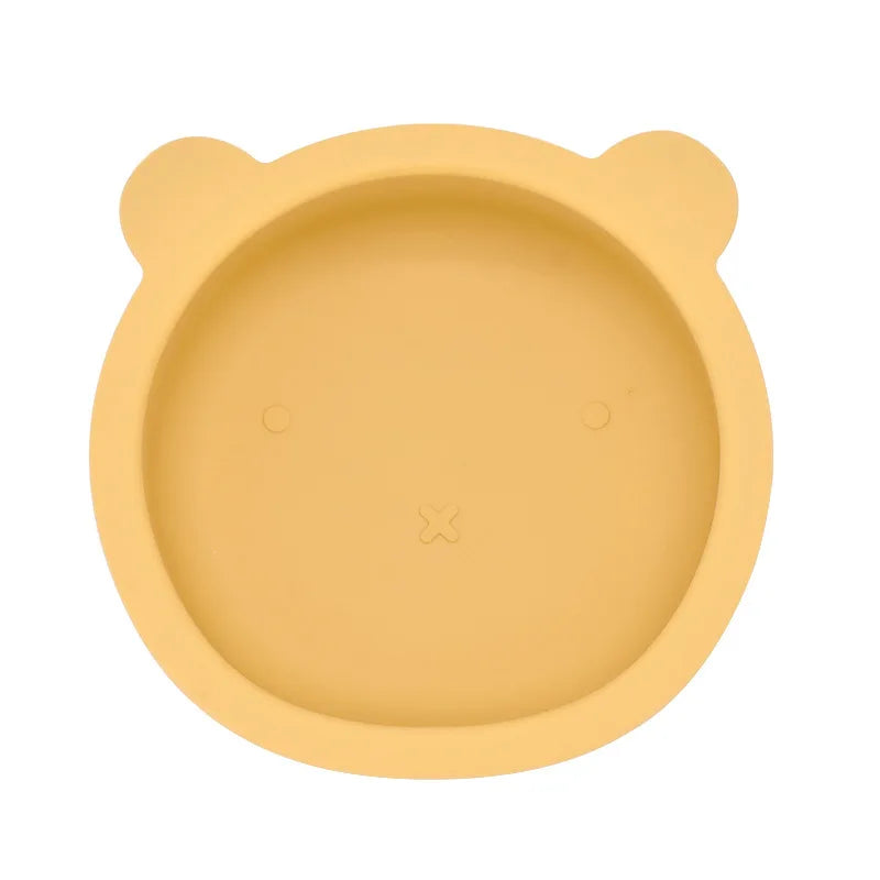 Yellow bowl with bear ears on a white background