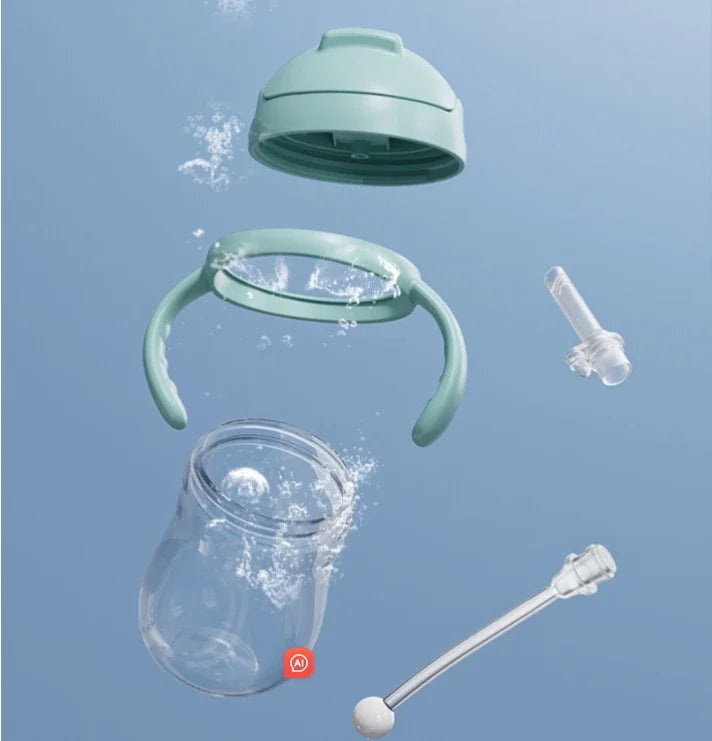 Teal and clear components of a baby bottle on a blue background