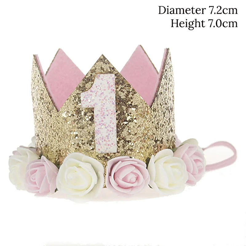 Gold glitter crown with pink and white flowers and a number '1' on a white background