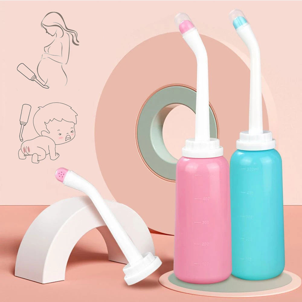 500ML Nestacular baby butt shower cleaning bottle in pink and blue for postpartum feminine care and perineal recovery.