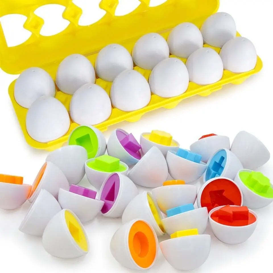 Colorful plastic eggs with a yellow egg carton on a white background
