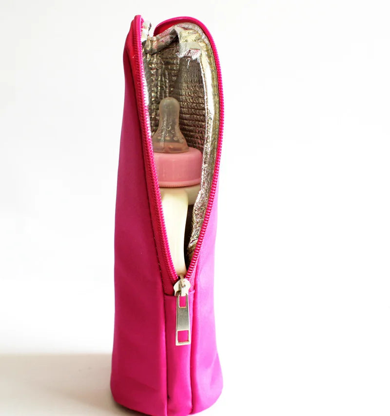 Pink insulated bottle bag with a baby bottle inside on a white background