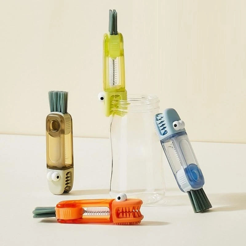 Set of four colorful kitchen scrubbers on a light background