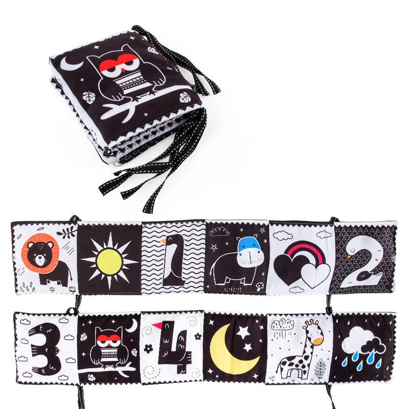 Children's educational fabric book with numbers and animals on a white background