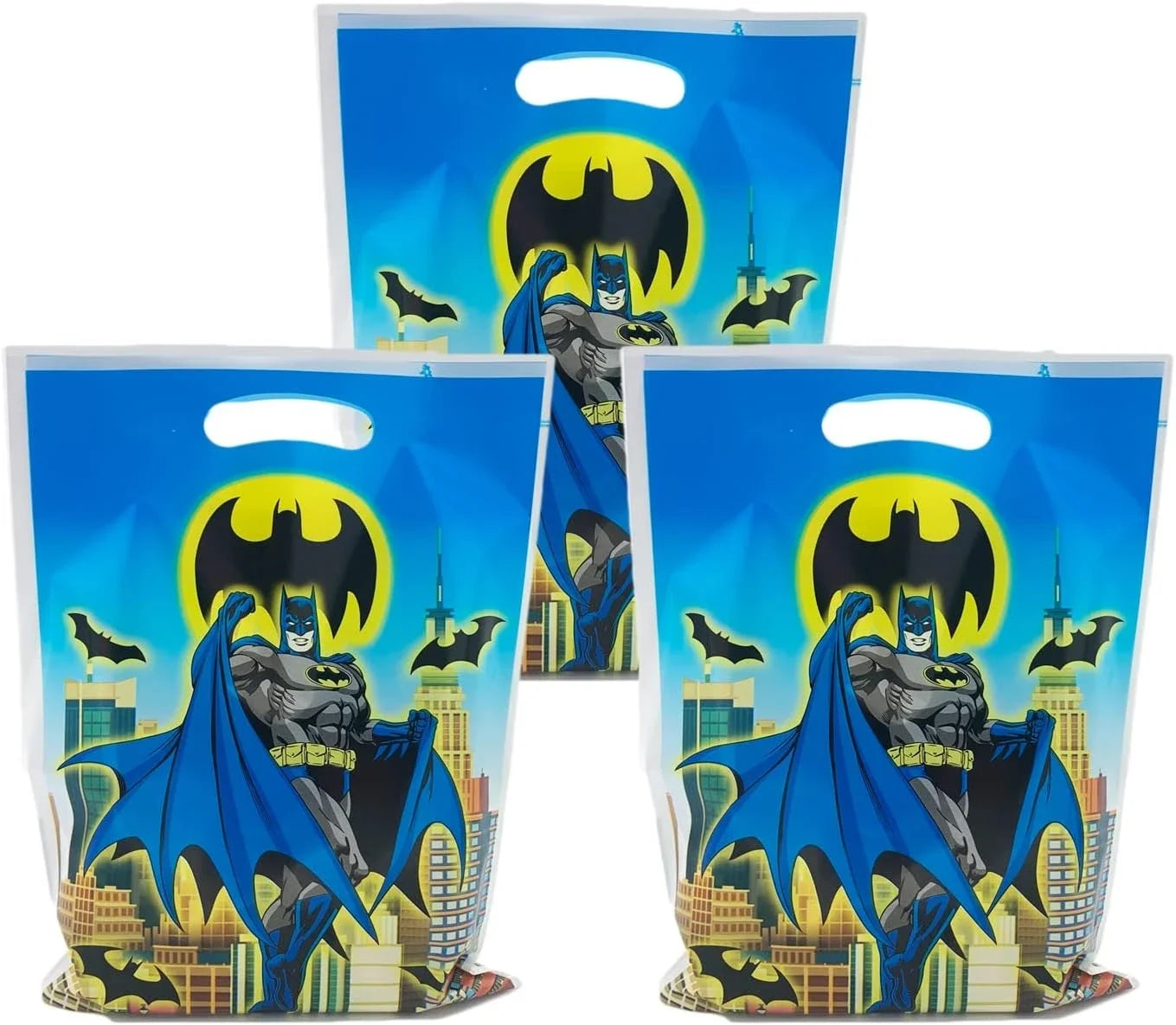Three Batman-themed goodie bags with superhero design on a white background