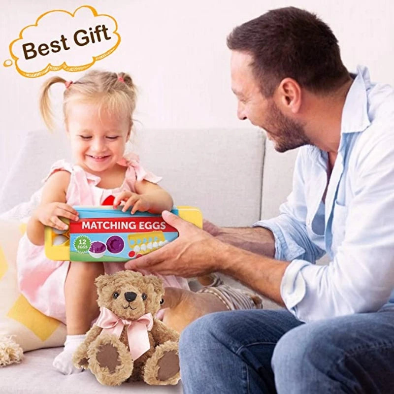 Man and child playing with a 'Matching Eggs' toy and teddy bear, labeled as 'Best Gift'.
