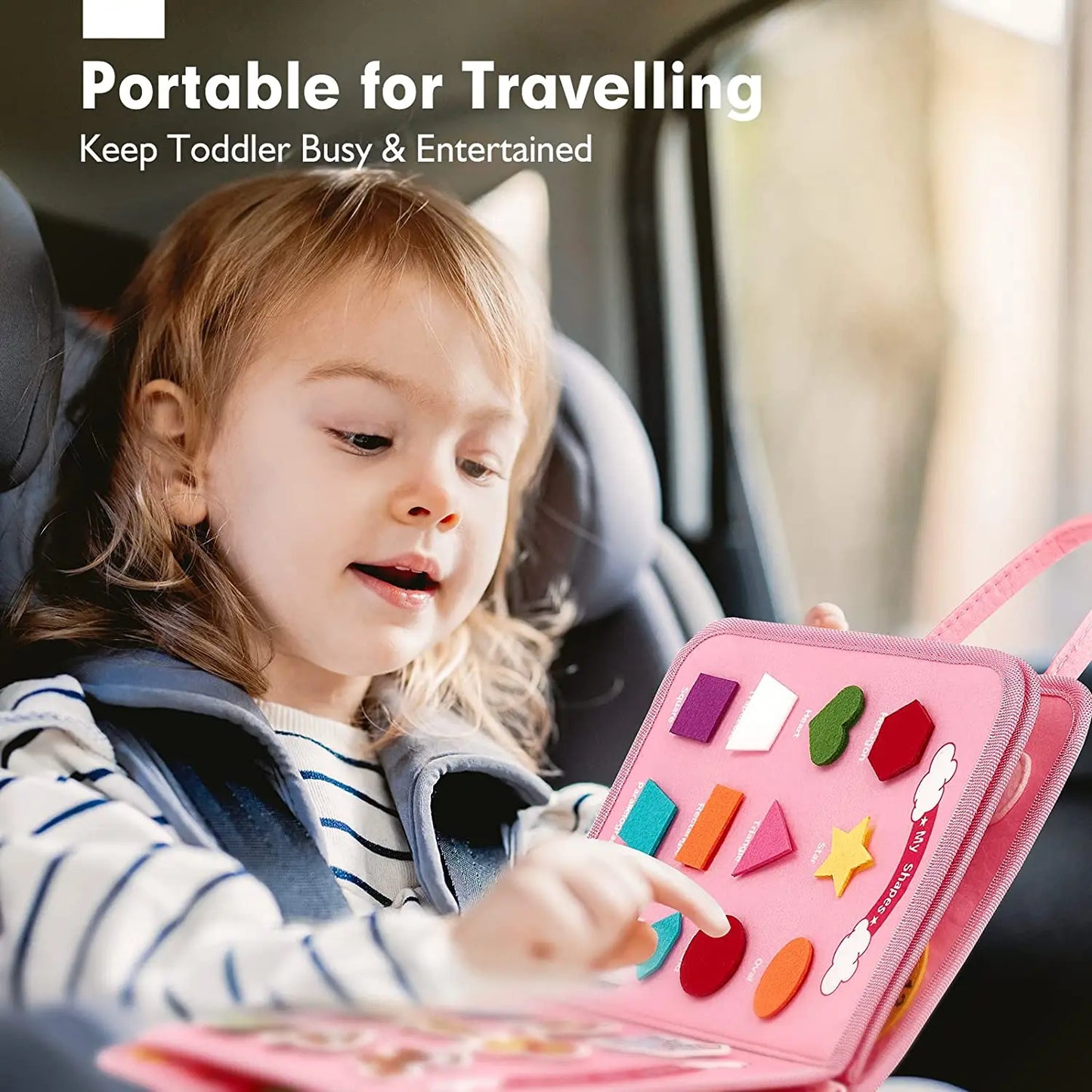 Child in a car seat playing with a pink travel toy set, with text 'Portable for Travelling' and 'Keep Toddler Busy & Entertained'.