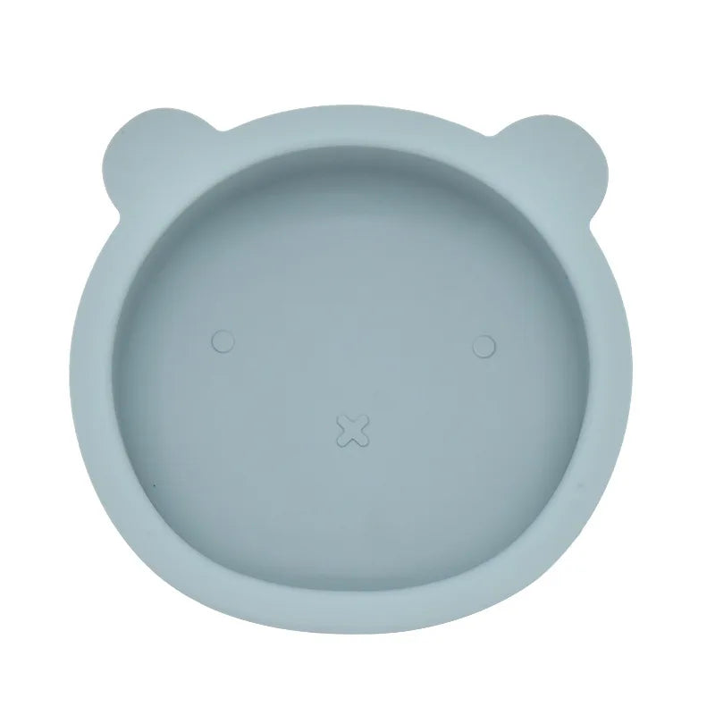 Light blue silicone bowl with bear ears on a white background