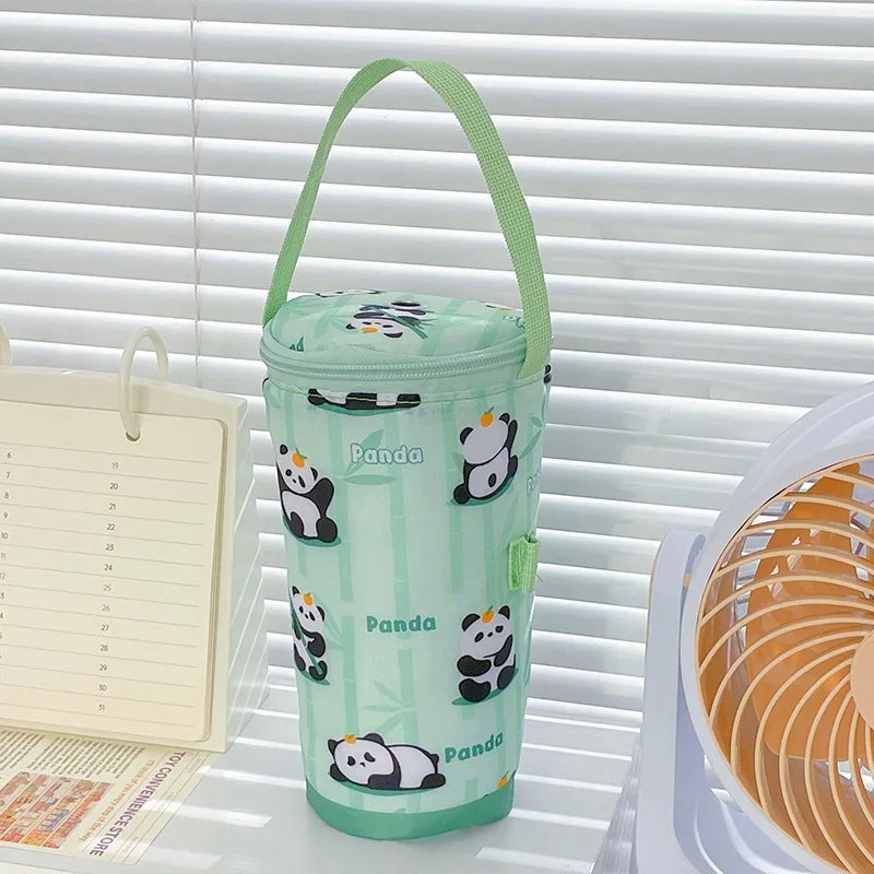 Green cylindrical water bottle holder with panda designs on a white surface.