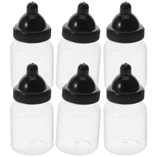 Set of six clear bottles with black lids on a white background