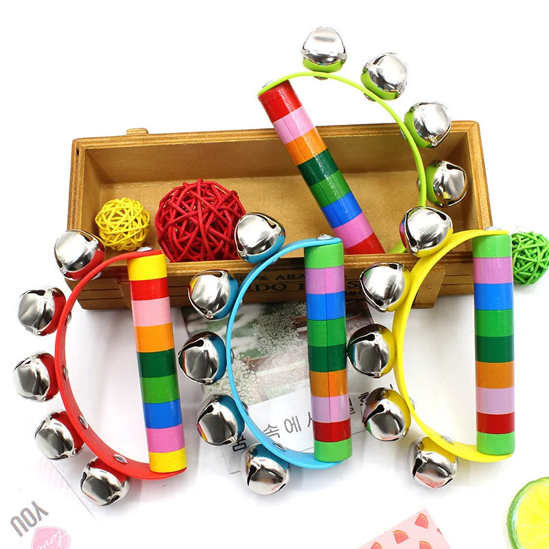 Colorful children's musical instruments with jingles on a white background