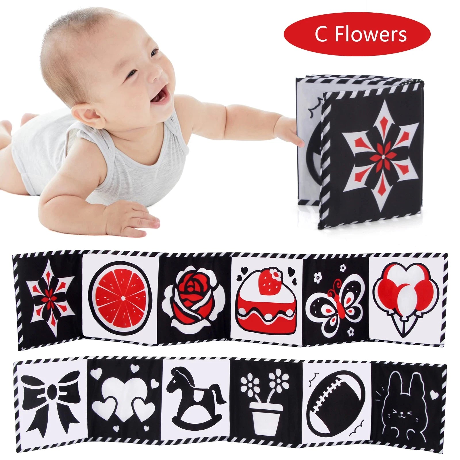 Baby playing with a black and white soft book with colorful patterns, featuring the brand 'C Flowers'.