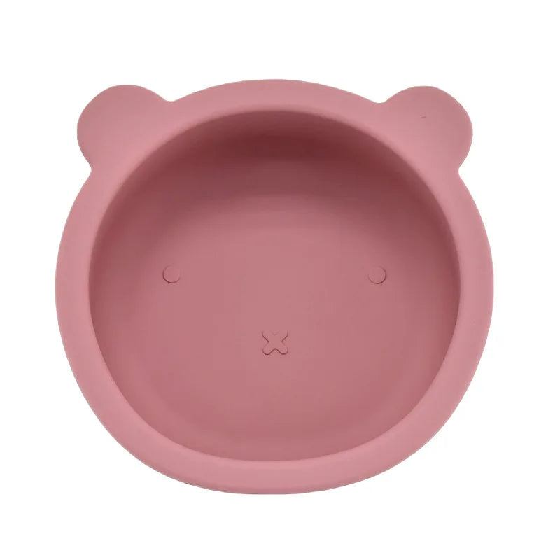 Pink pet bowl with bear ears on a white background