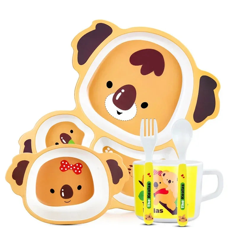 Children's dinner set with cartoon dog design on a white background