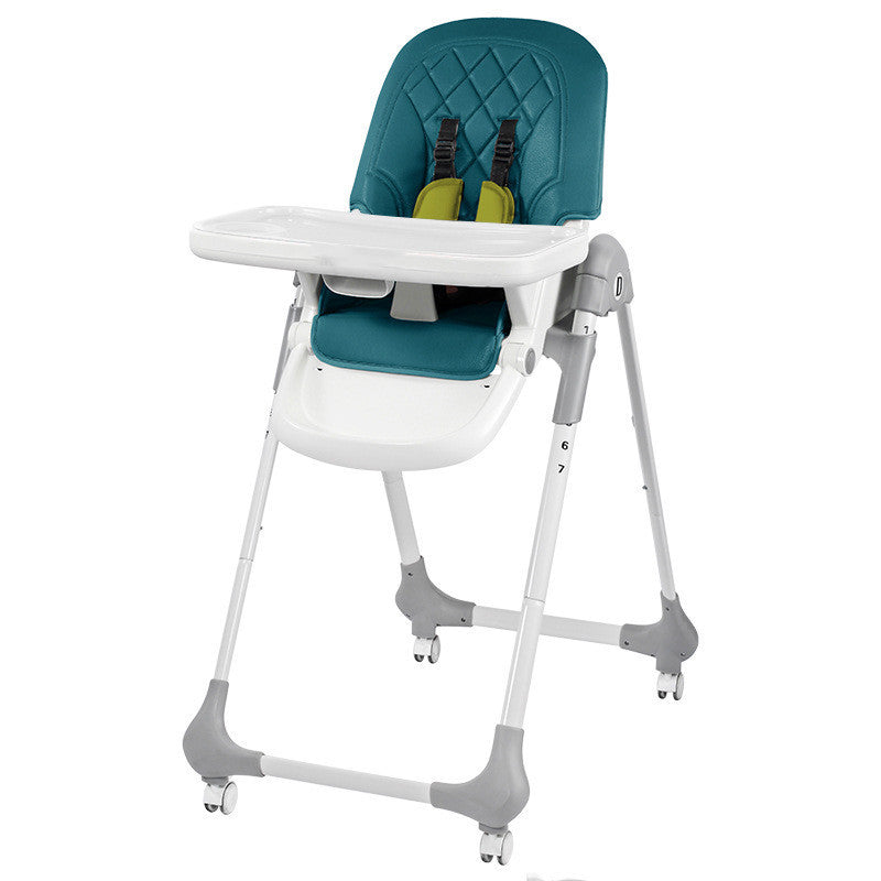 Teal and white high chair on a white background