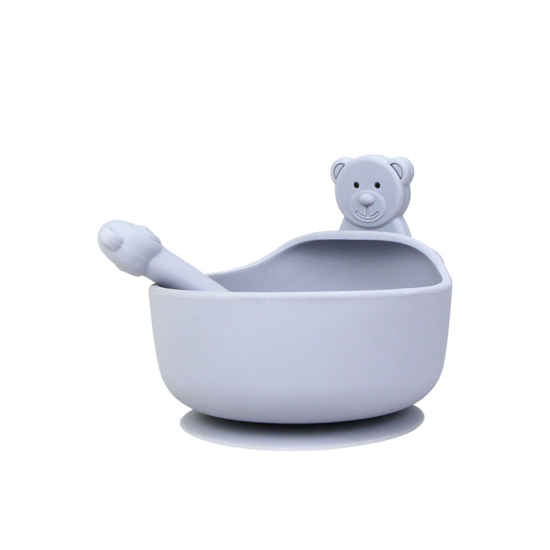 Children's bowl and spoon set with bear design on a white background