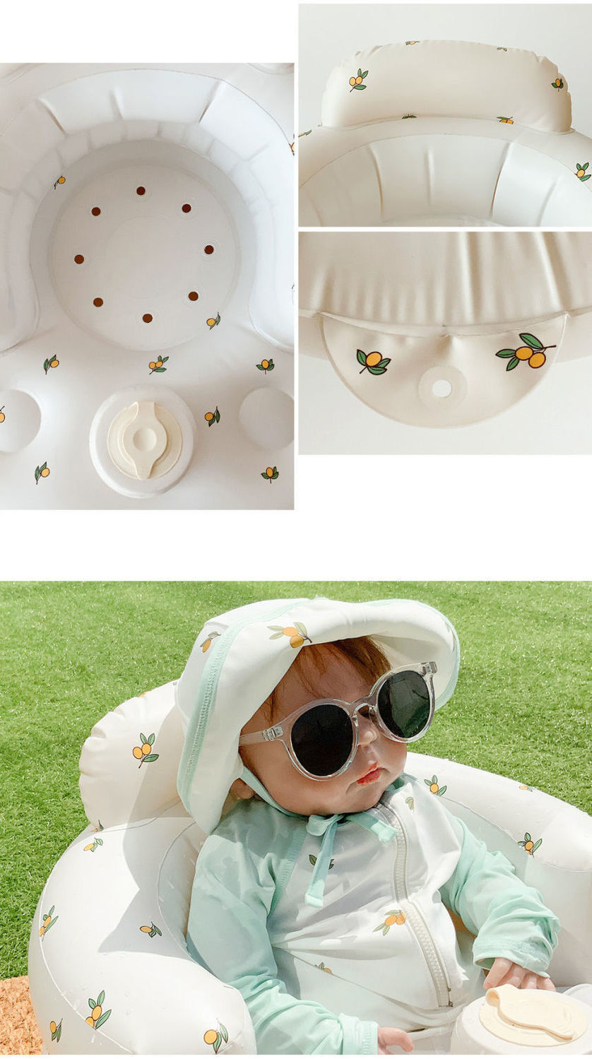 Baby in a white chair with a hood and sunglasses, surrounded by close-up shots of the chair's design.
