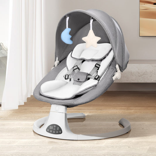 Baby swing with star and cloud toys on a wooden floor
