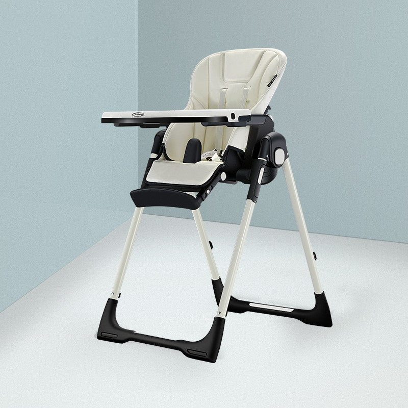 Modern high chair with a tray on a light gray background