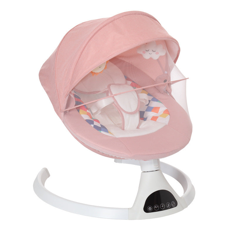 Pink baby bouncer with colorful diamond pattern on a wooden floor.
