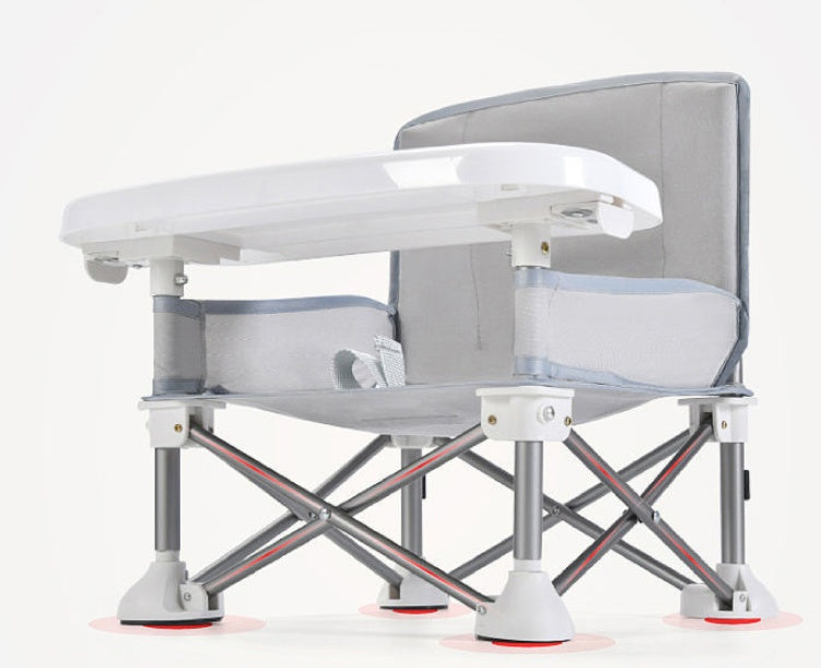 Foldable chair with a table on a white background