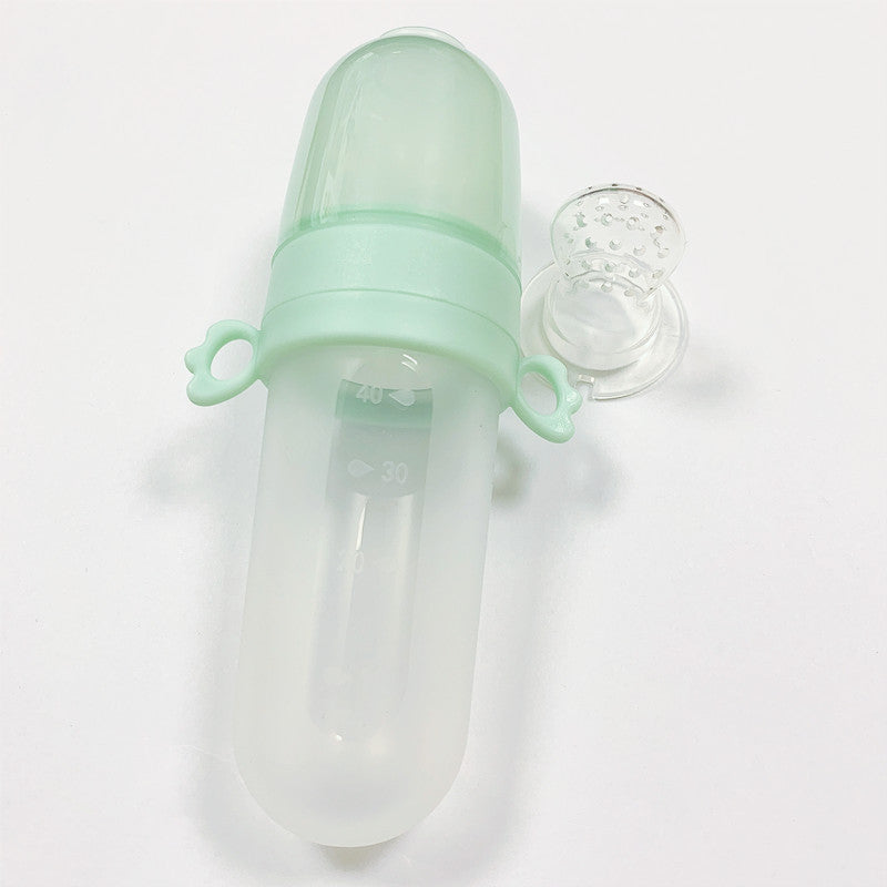 Mint green baby bottle with clear cap on a white background