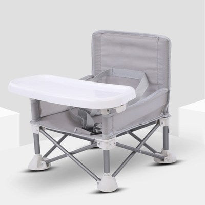 Foldable baby seat with tray on a white background