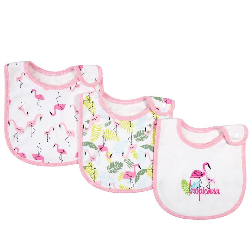 Three baby bibs with flamingo designs on a white background