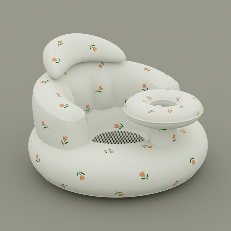 White inflatable pool float with floral patterns on a gray background