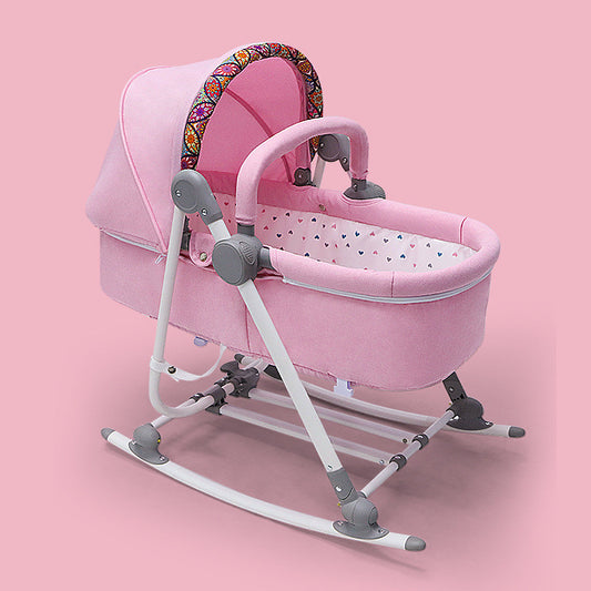 Pink baby bassinet with floral canopy on a pink background